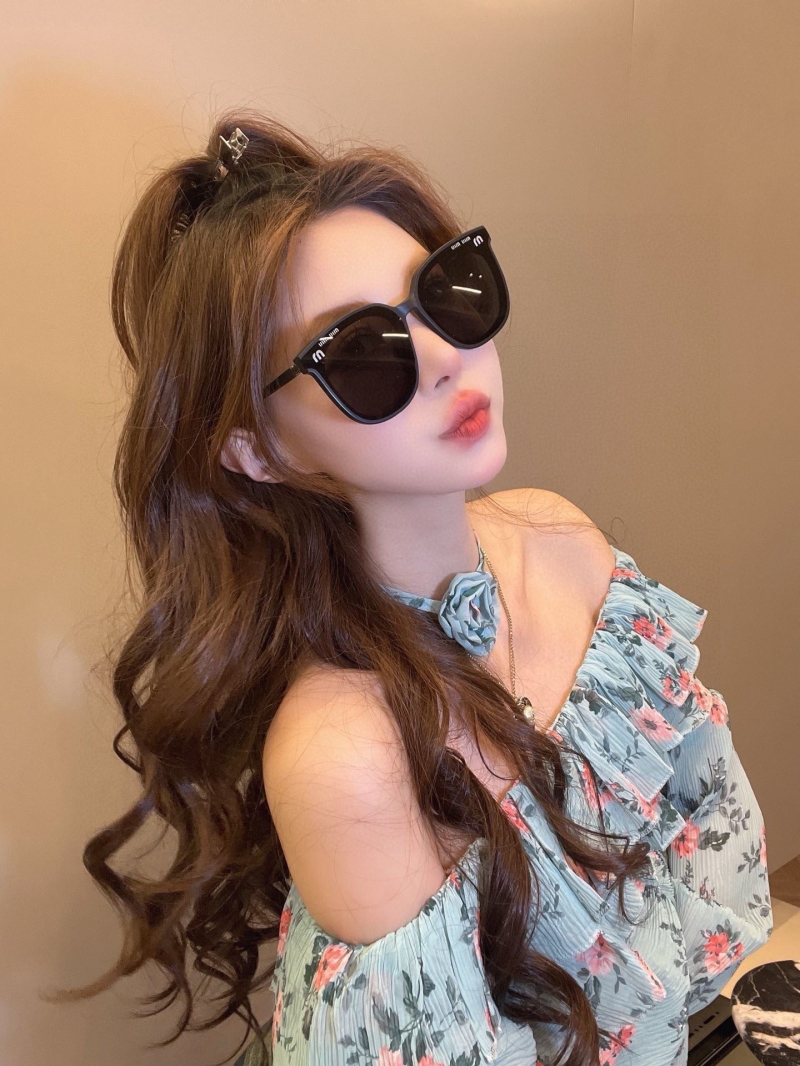 Miu miu Sunglasses